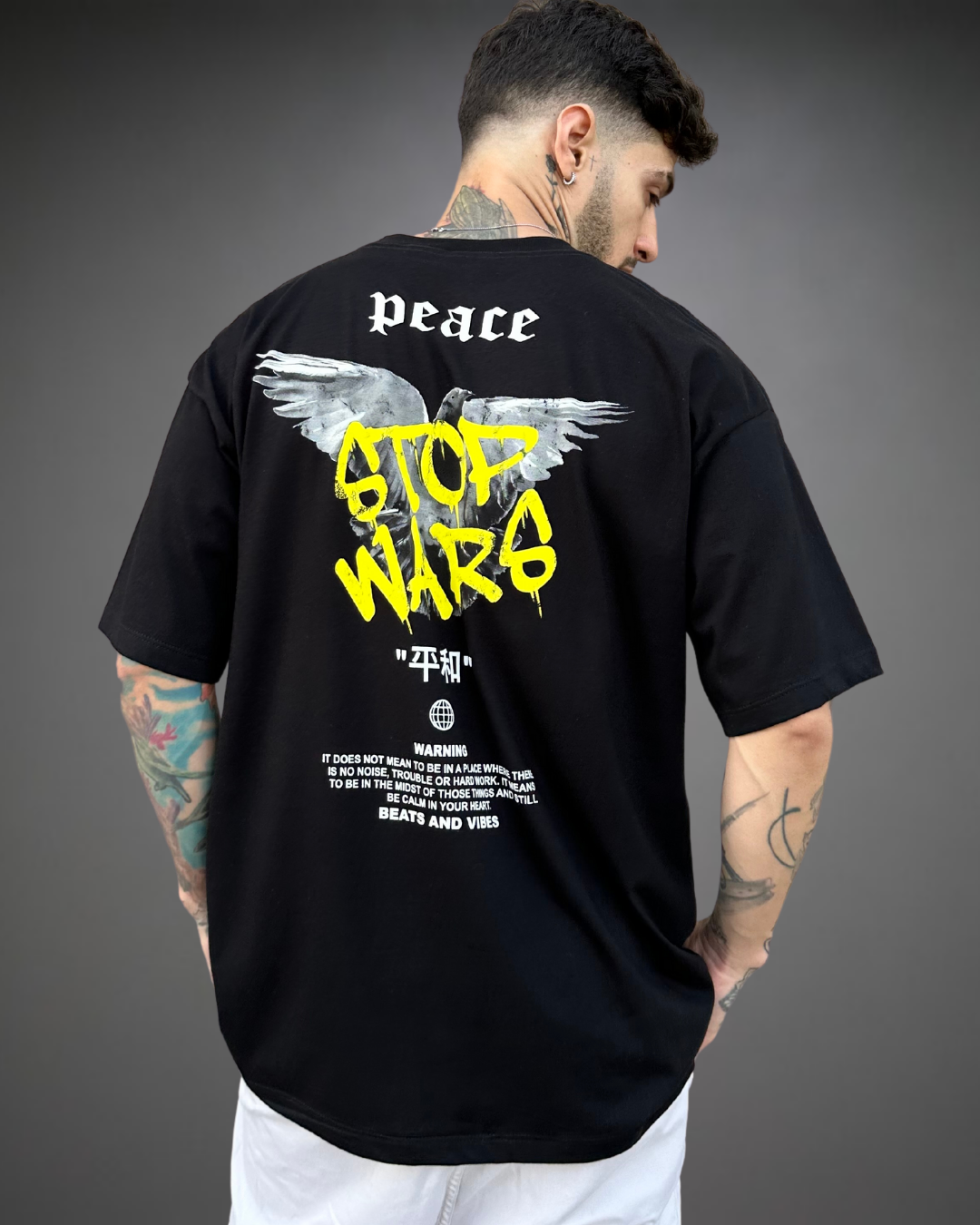 Polo Hombre Oversize Stop Wars - Negro