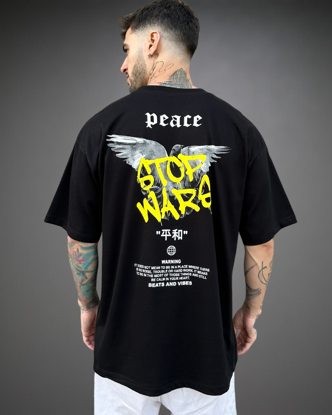 Polo Hombre Oversize Stop Wars - Negro