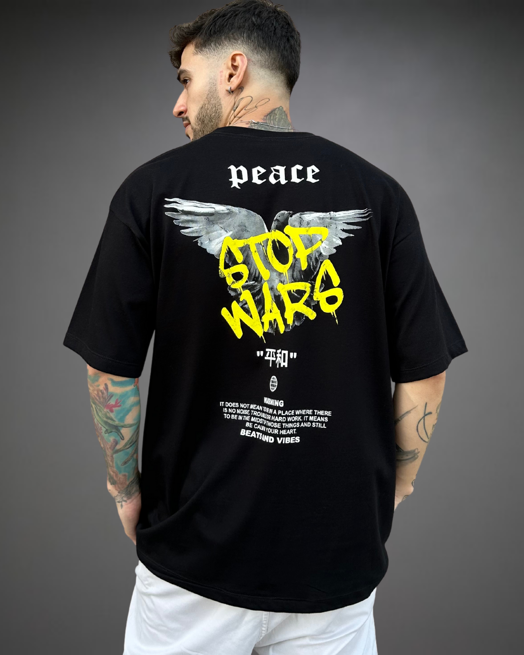Polo Hombre Oversize Stop Wars - Negro