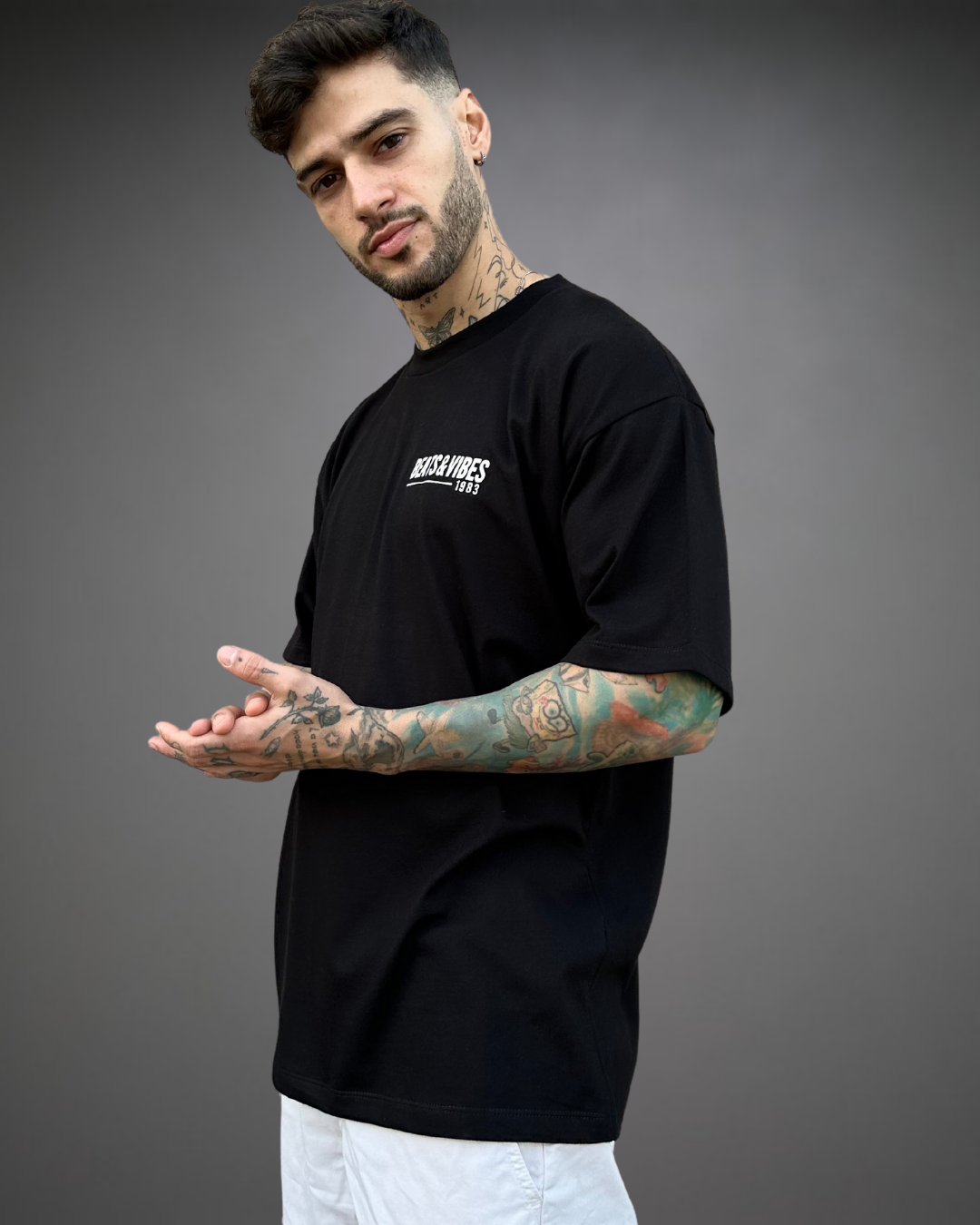 Polo Hombre Oversize Stop Wars - Negro