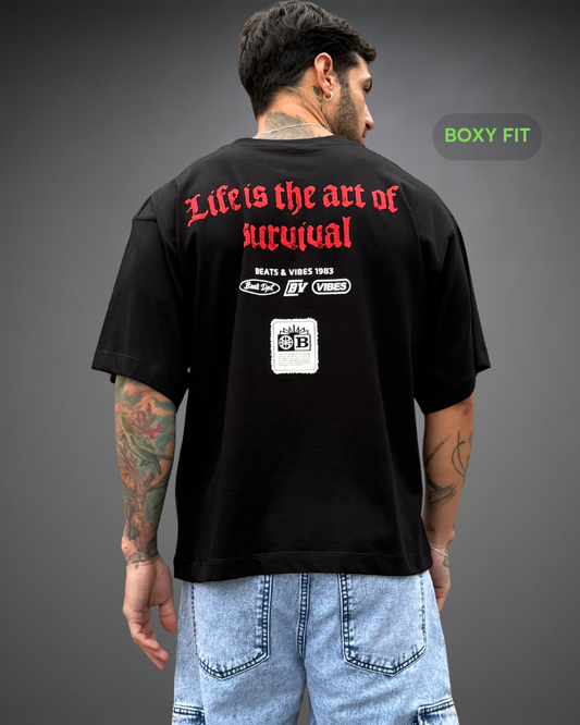 Polo Hombre Boxy Fit Survival Star - Negro