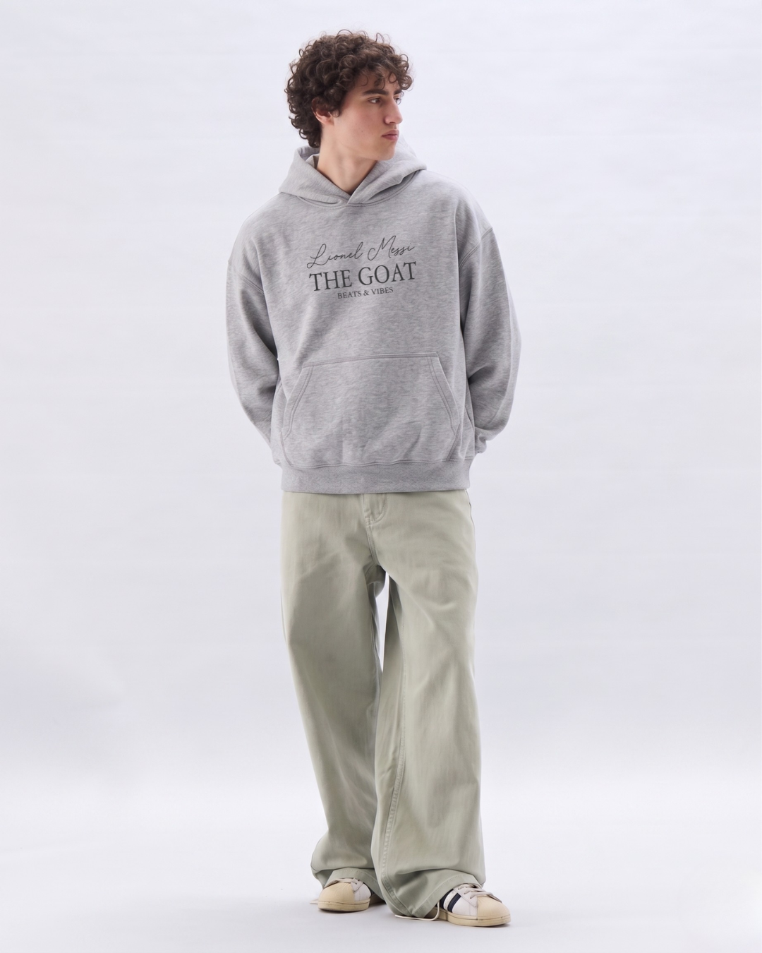 Hoodie "Messi THE GOAT" – Edición Campeón del Mundo / Gris