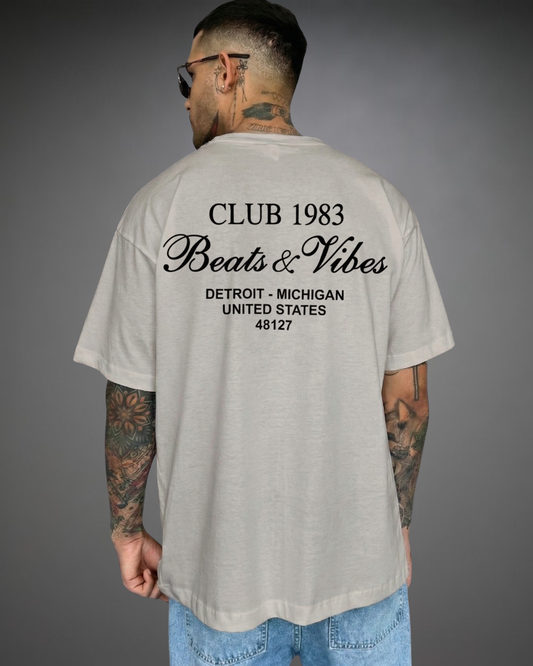 Polo Hombre Oversize Club Beats 1983 - Gris