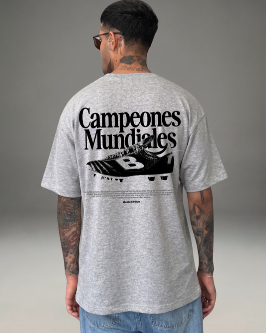 Polo Hombre Oversize Campeones Mundiales - Gris